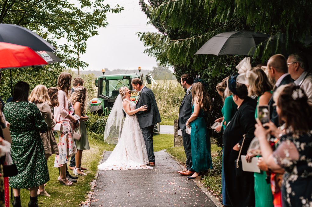 Rain on your wedding day. Tewkesbury wedding photographer