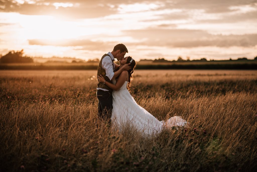 cotswolds wedding photographer. golden hour with bride and groom