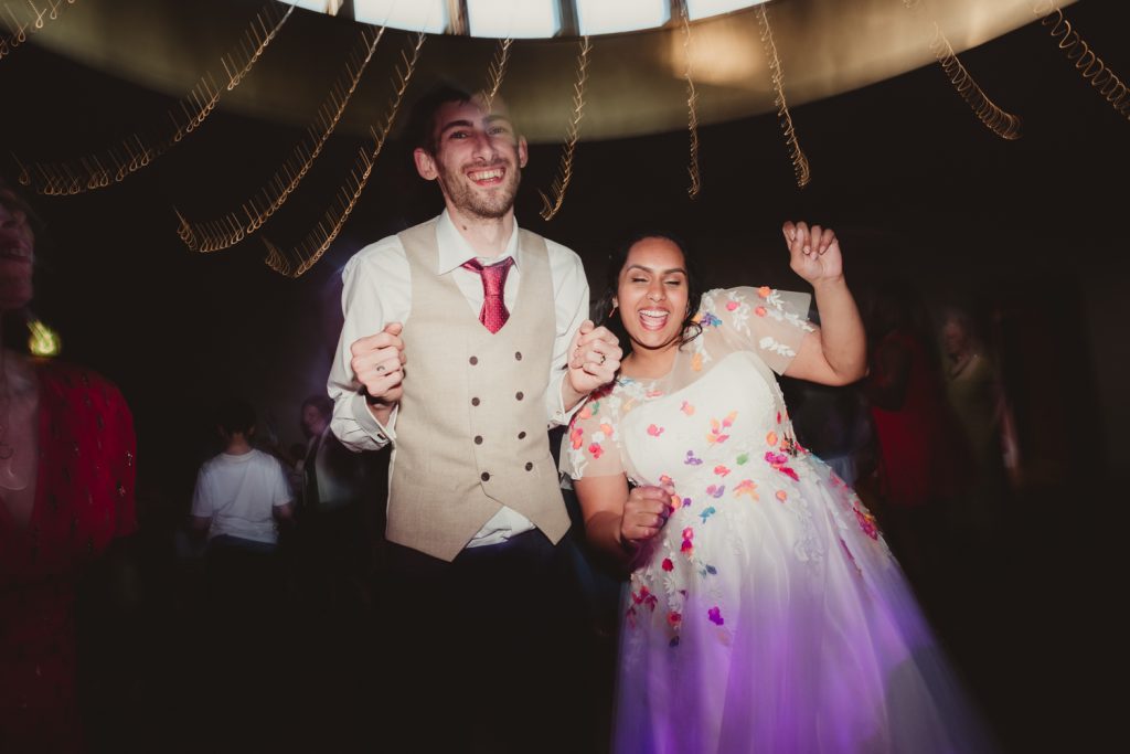 A bride and groom dancing at The Matara Centre