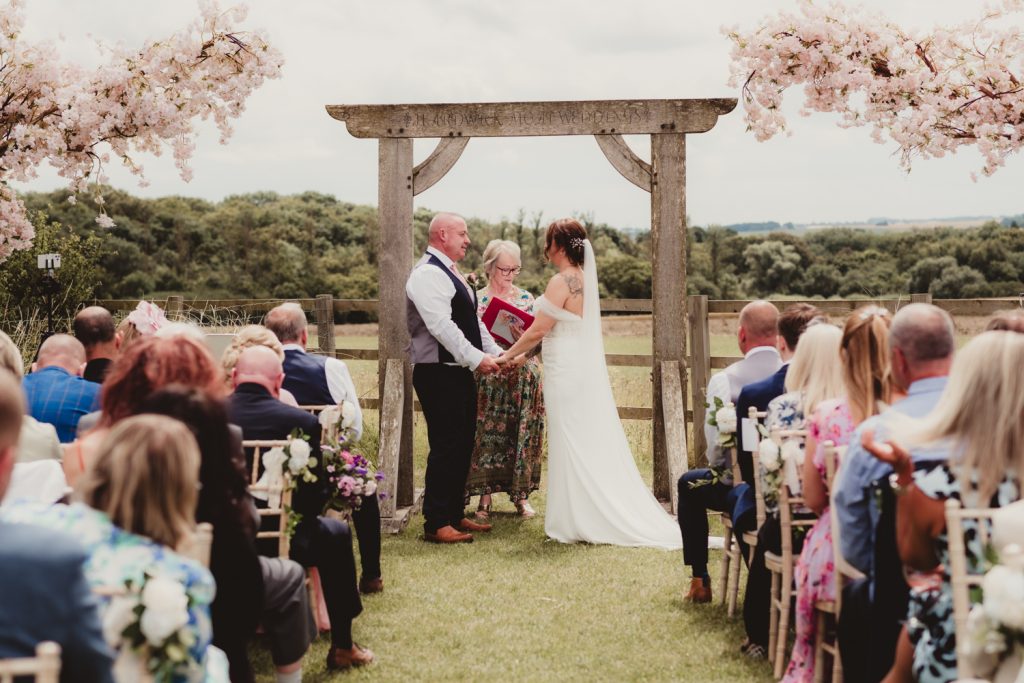 Outdoor wedding ceremony at Hardwick Moat Weddings