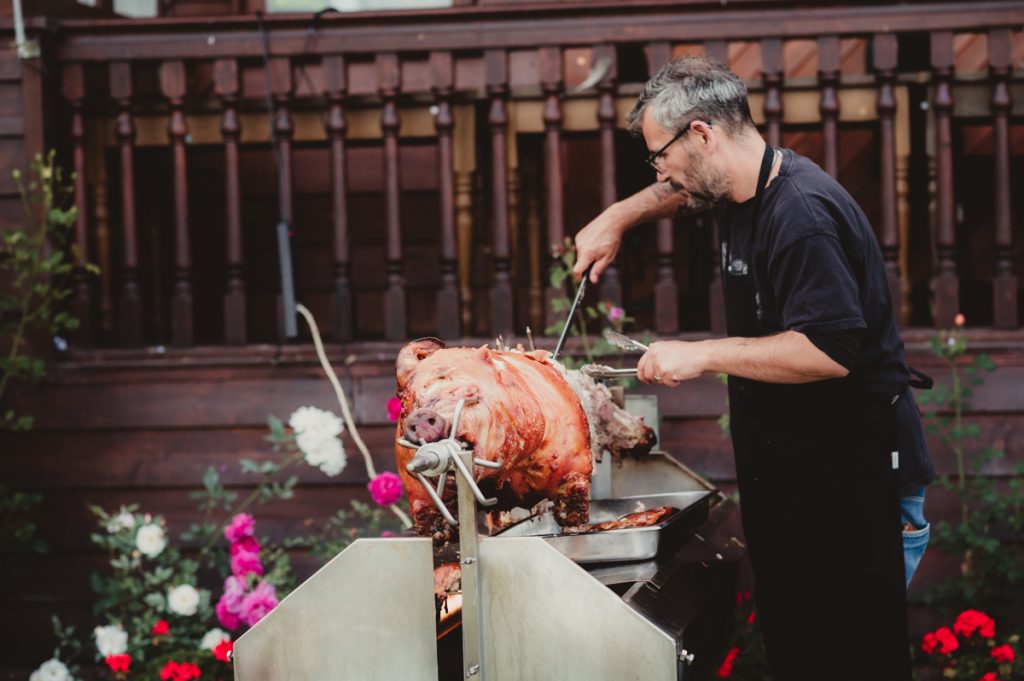 A hog roast wedding breakfast being prepared