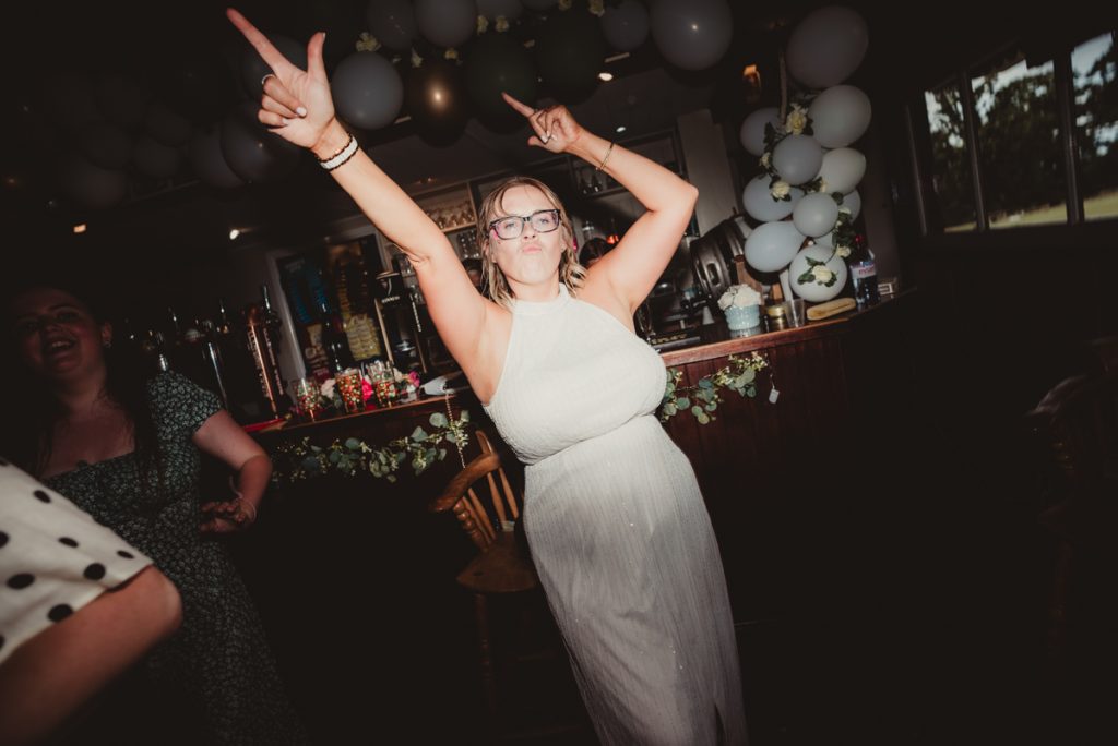 Bride on the dance floor at Dumbleton Cricket Club