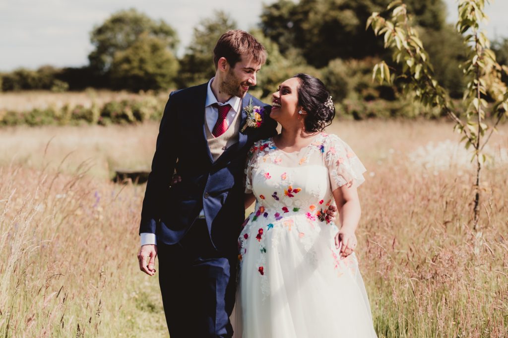 A bride and groom looking happy and in love at the matara Centre