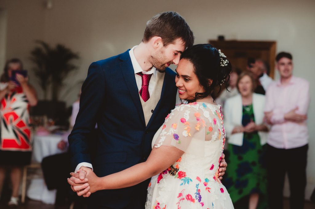 A bride and groom having their first dance at the Matara centre