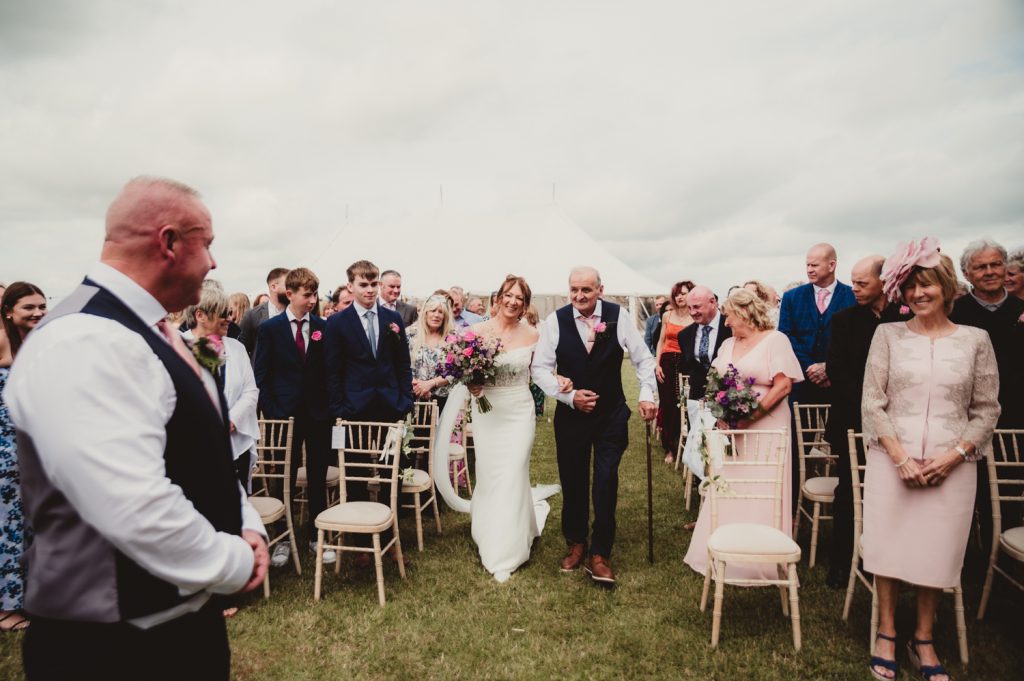 Bride & her Dad walking down the aisle at Hardwick Moat Weddings