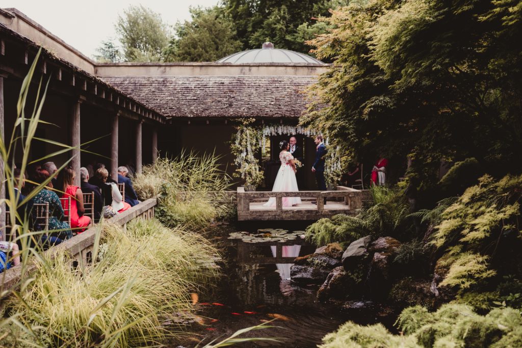 A beautiful wedding ceremony, captured by a cotswolds wedding photographer at the Matara Centre