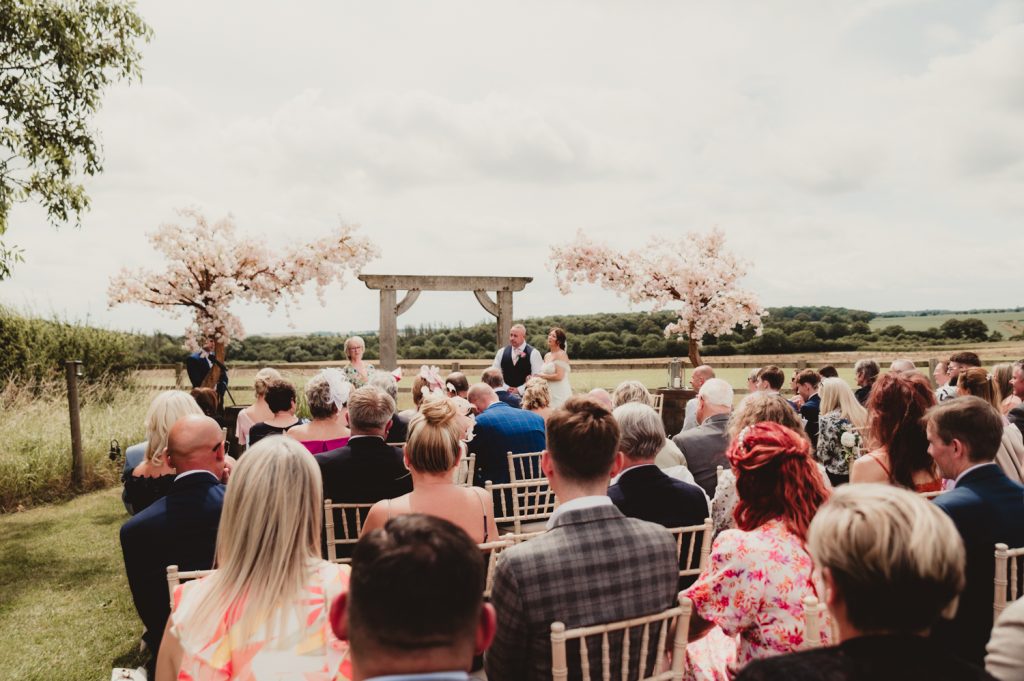 outdoor wedding ceremony at Hardwick Moat Weddings